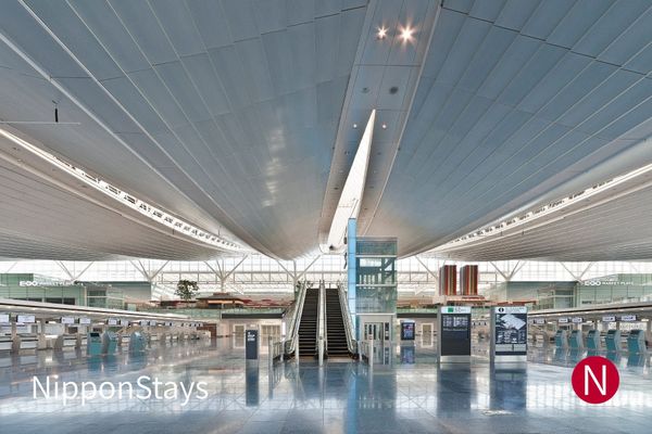 The empty departures hall of an airport terminal
