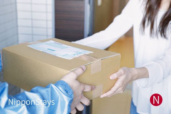 A parcel being handed over to a courier in Japan
