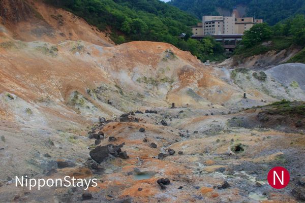 The sulphur-stained slopes of Jigokudani above Noboribetsu Onsen