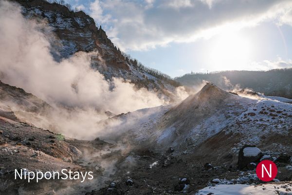 Steam rising from the Jigokudani hell valley at Noboribetsu in winter