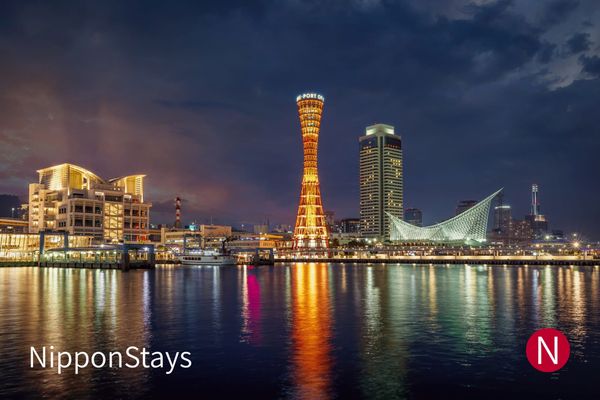 Kobe waterfront and Port Tower illuminated at night