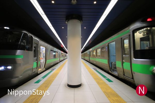Trains at the underground platform of New Chitose Airport Station