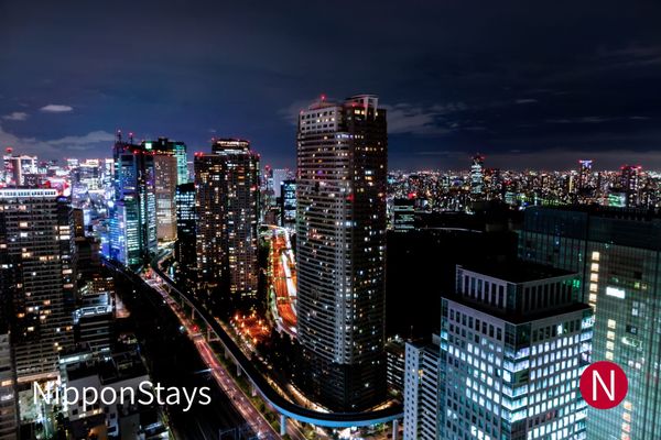 Tokyo's high-rise cityscape illuminated at night