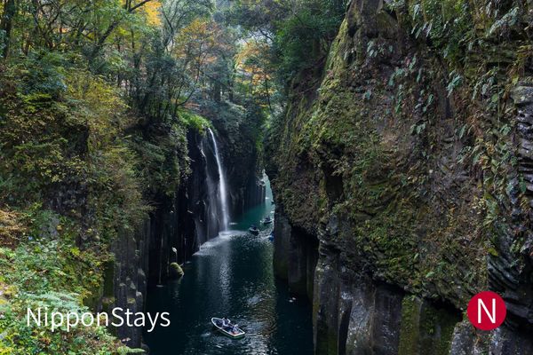 The waterfall and rowing boats in Takachiho Gorge