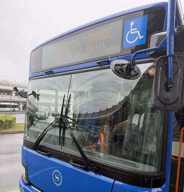 Sheraton Grande Tokyo Bay Hotel shuttle bus at Maihama Station with its destination sign in English and Japanese