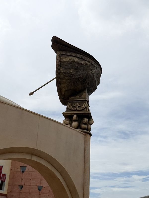 Sundial sculpture on an arch at Ikspiari, the shopping mall beside Maihama Station