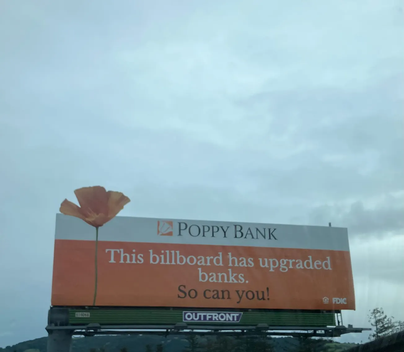 Poppy Bank's New Billboard is Taking a Jab at Exchange Bank