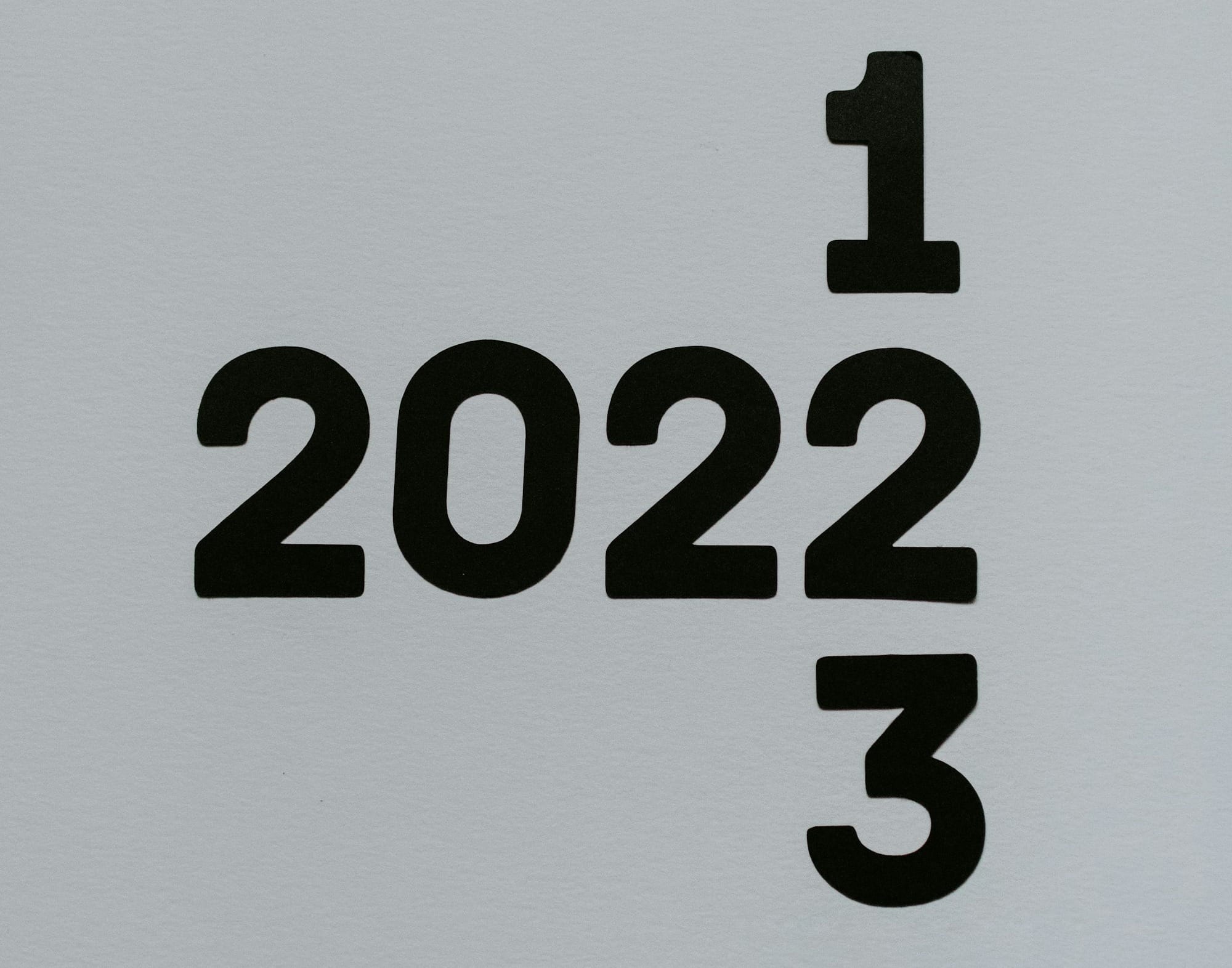 a white piece of paper with a black number on it