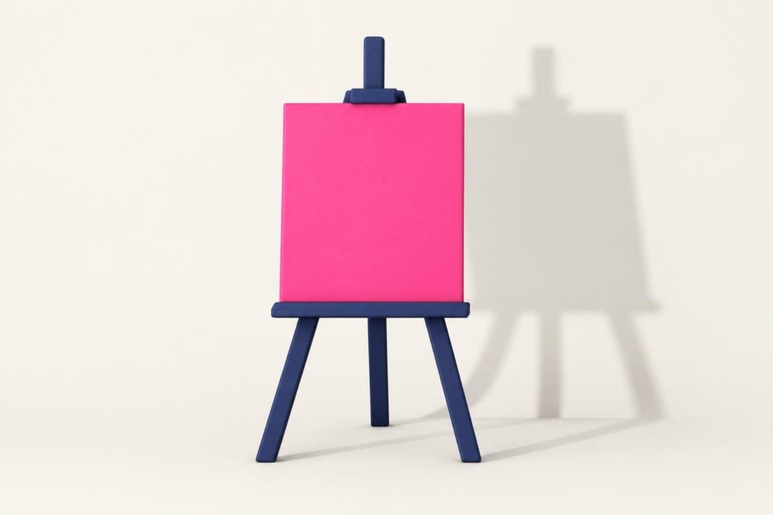 A blank pink canvas on a navy easel, casting a long shadow on a cream wall.