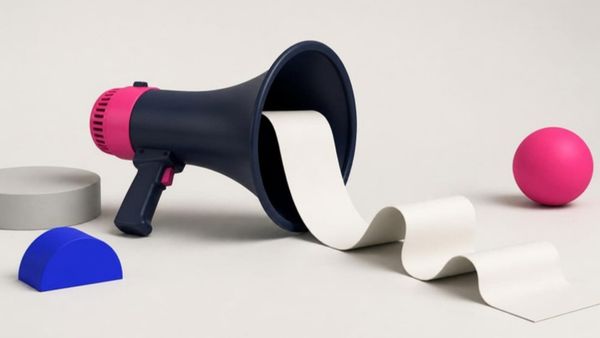 A navy megaphone with a long blank receipt spooling out of it.