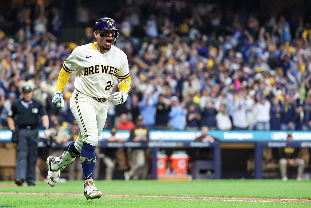 William Contreras celebrates while rounding the bases for the Milwaukee Brewers during the 2026 postseason.