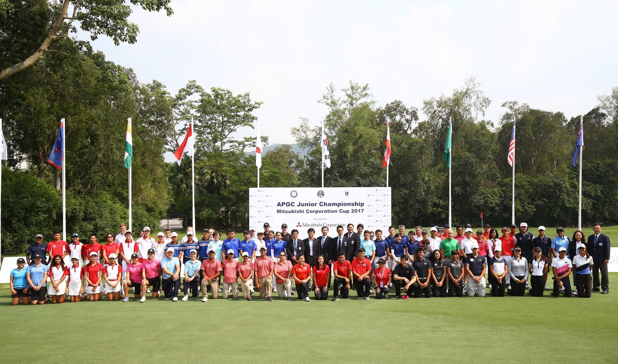 Players and officials on the putting green at the Hong Kong Golf Club.
