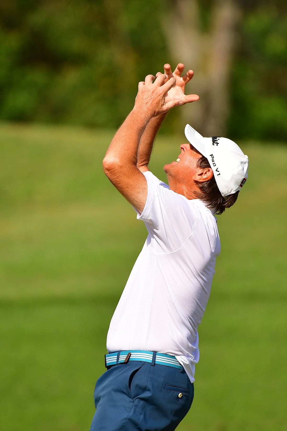 Hong Kong's Doug Williams can't hide his anguish as a putt refuses to drop. 