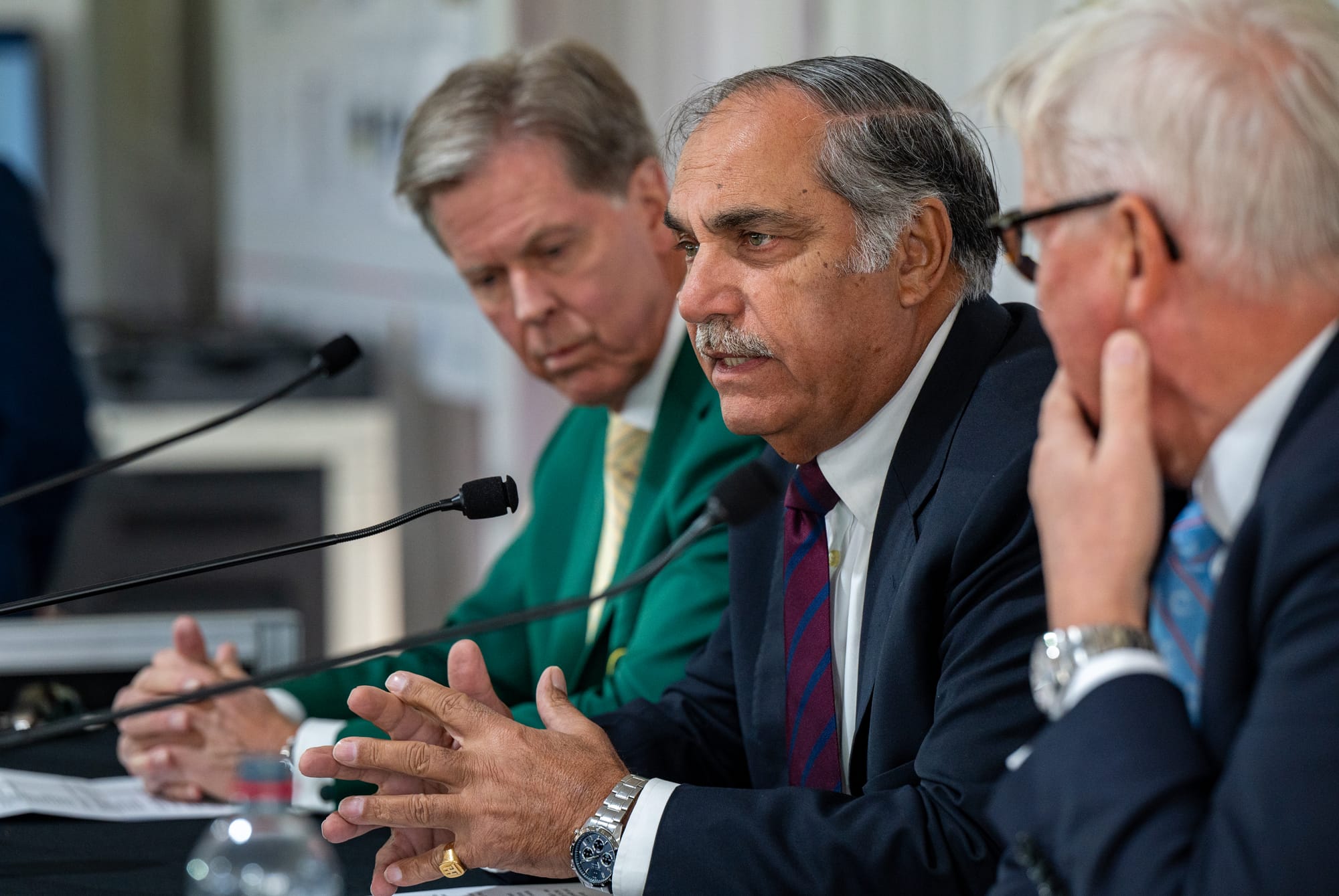 Flanked by Fred Ridley, Chairman of Augusta National Golf Club, and Martin Slumbers, CEO of The R&A, APGC Chairman Taimur Hassan Amin announces the venue for the 2024 Asia-Pacific Amateur Championship. Picture by AAC.