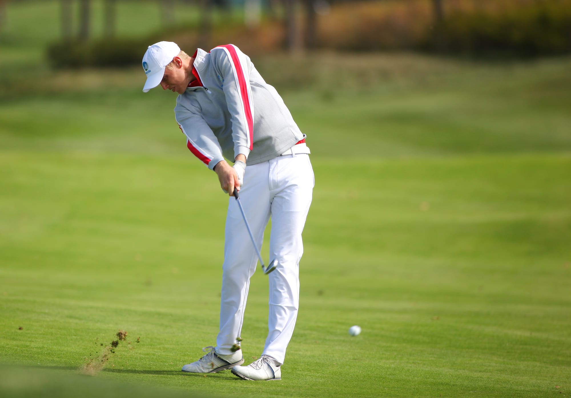 Australian Cameron Davis strikes a long-iron approach.