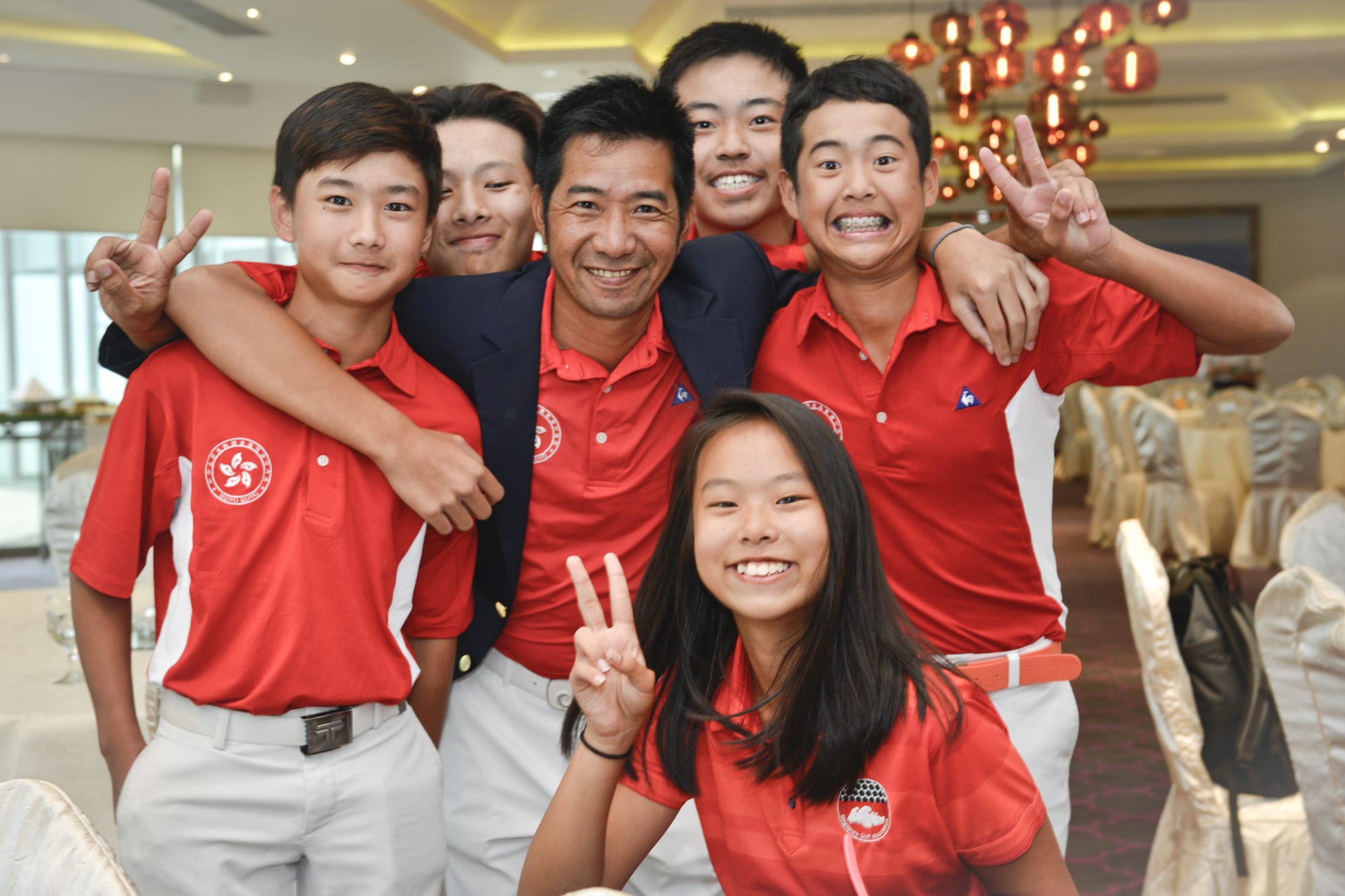 The Hong Kong contingent with coach Ducky Tang. 