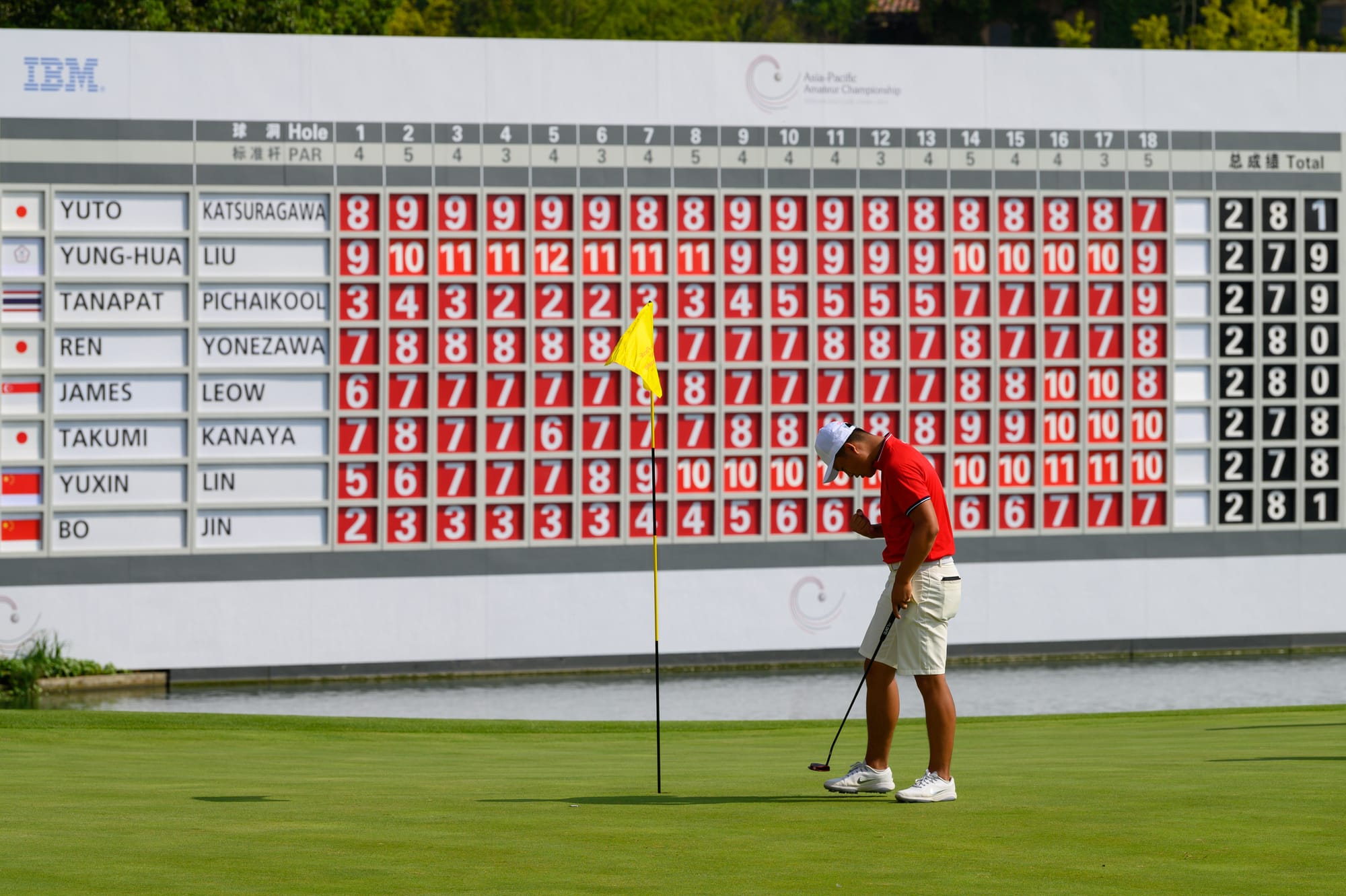 Lin Yuxin celebrates after holing the winning putt in the play-off.