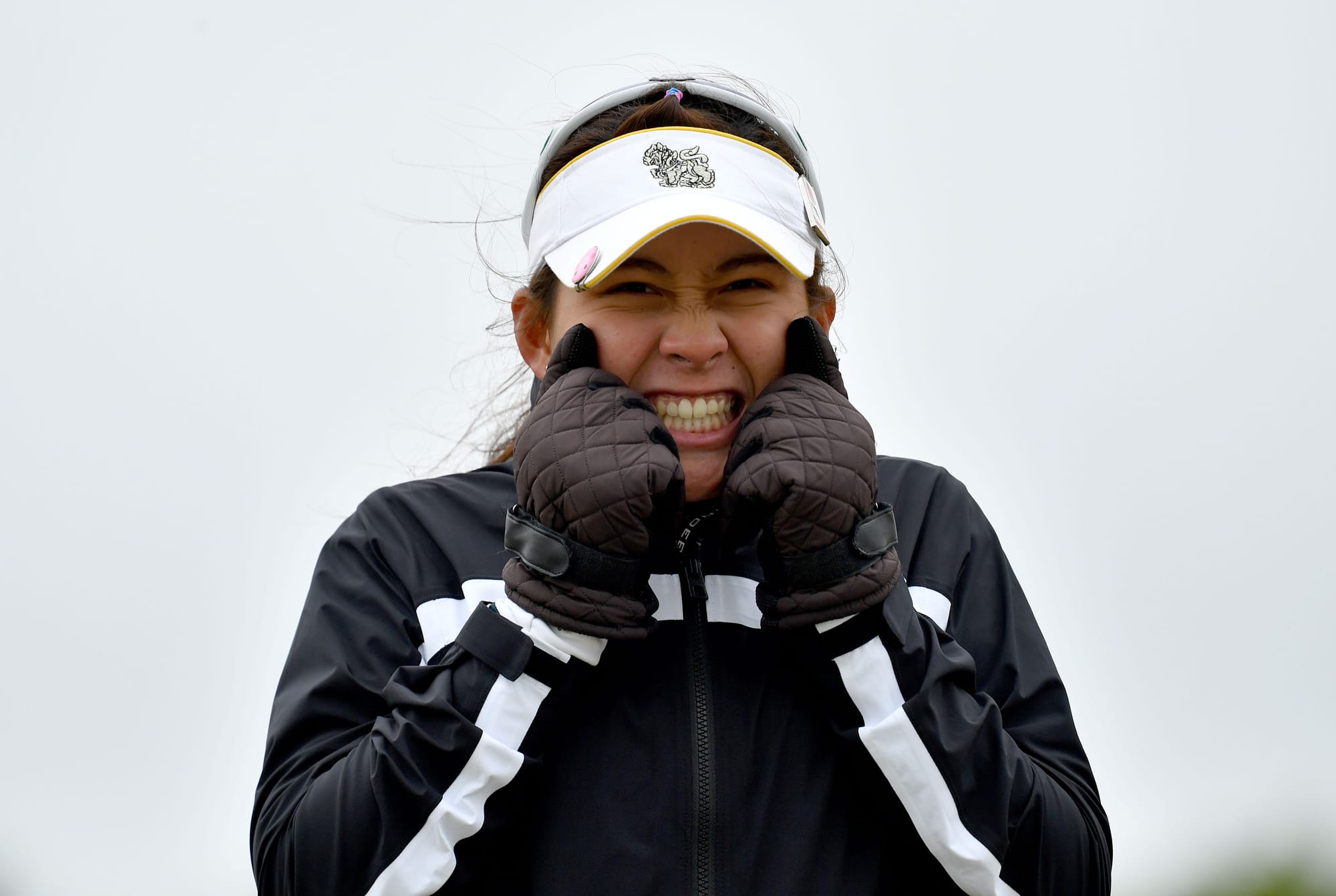 Atthaya Thitikul's  title hopes were scuppered by a 78 in freezing conditions on day two.