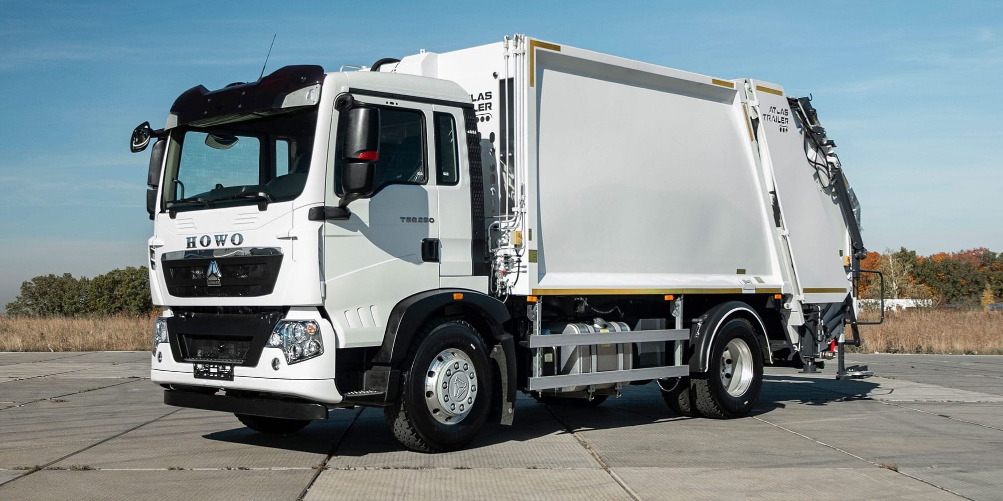 Мусоровоз HOWO. Фото: atlas-trailer.