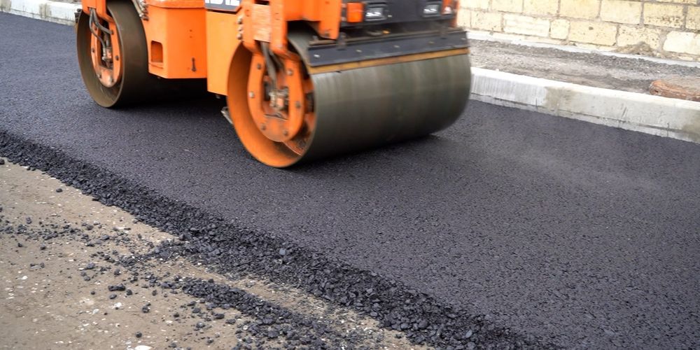 В Манасском районе началась укладка асфальта на трассе Чон-Капка – Ак-Таш – Майское изображение публикации