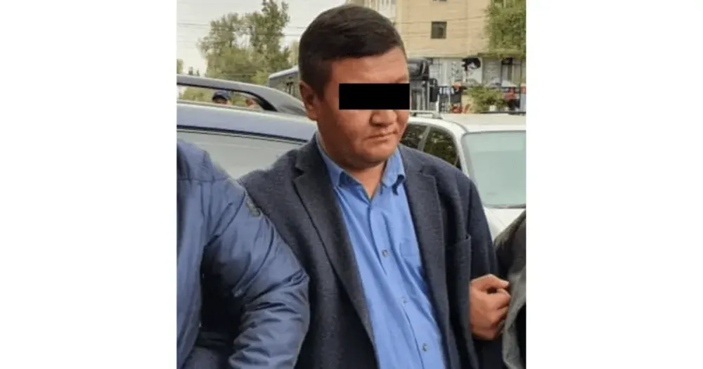 Задержанный финполовец вымогал у ОсОО взятку за положительное решение по уплате НДС — АКС ГКНБ изображение публикации