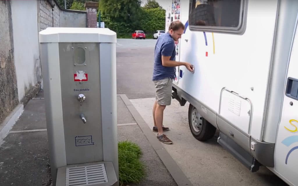 Filling a motorhome with fresh water at a service point terminal