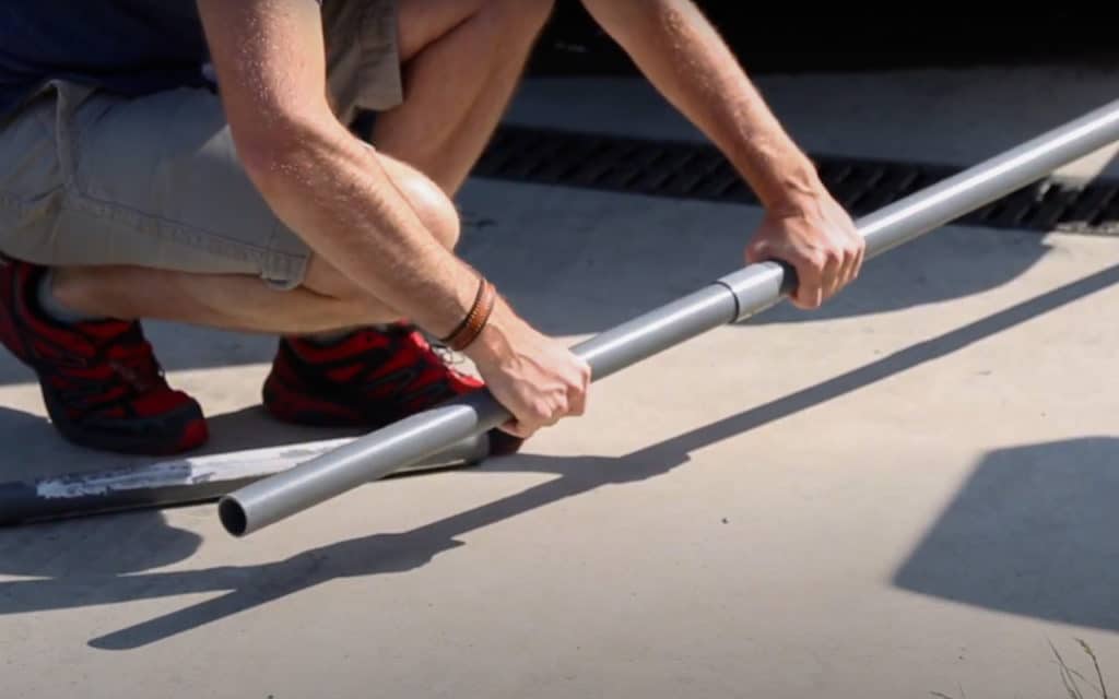 Fitting an extension pipe to a motorhome grey water outlet