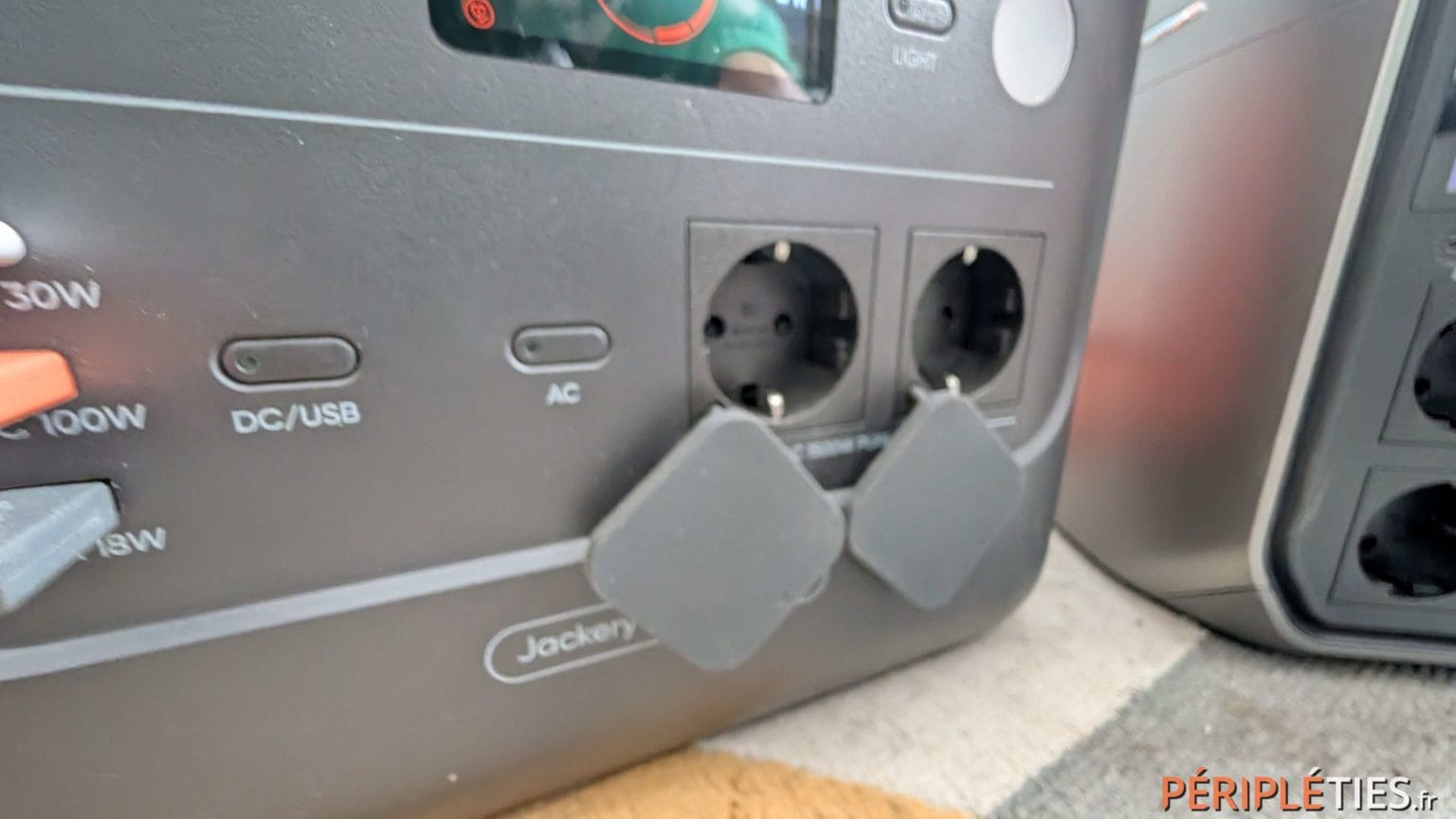 Two 230V outlets protected by covers