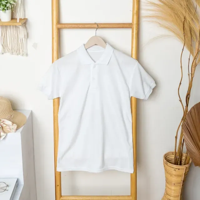 minimalist flat-lay of a blank crewneck t-shirt, showcasing the type of apparel used to start a Printify t-shirt business.