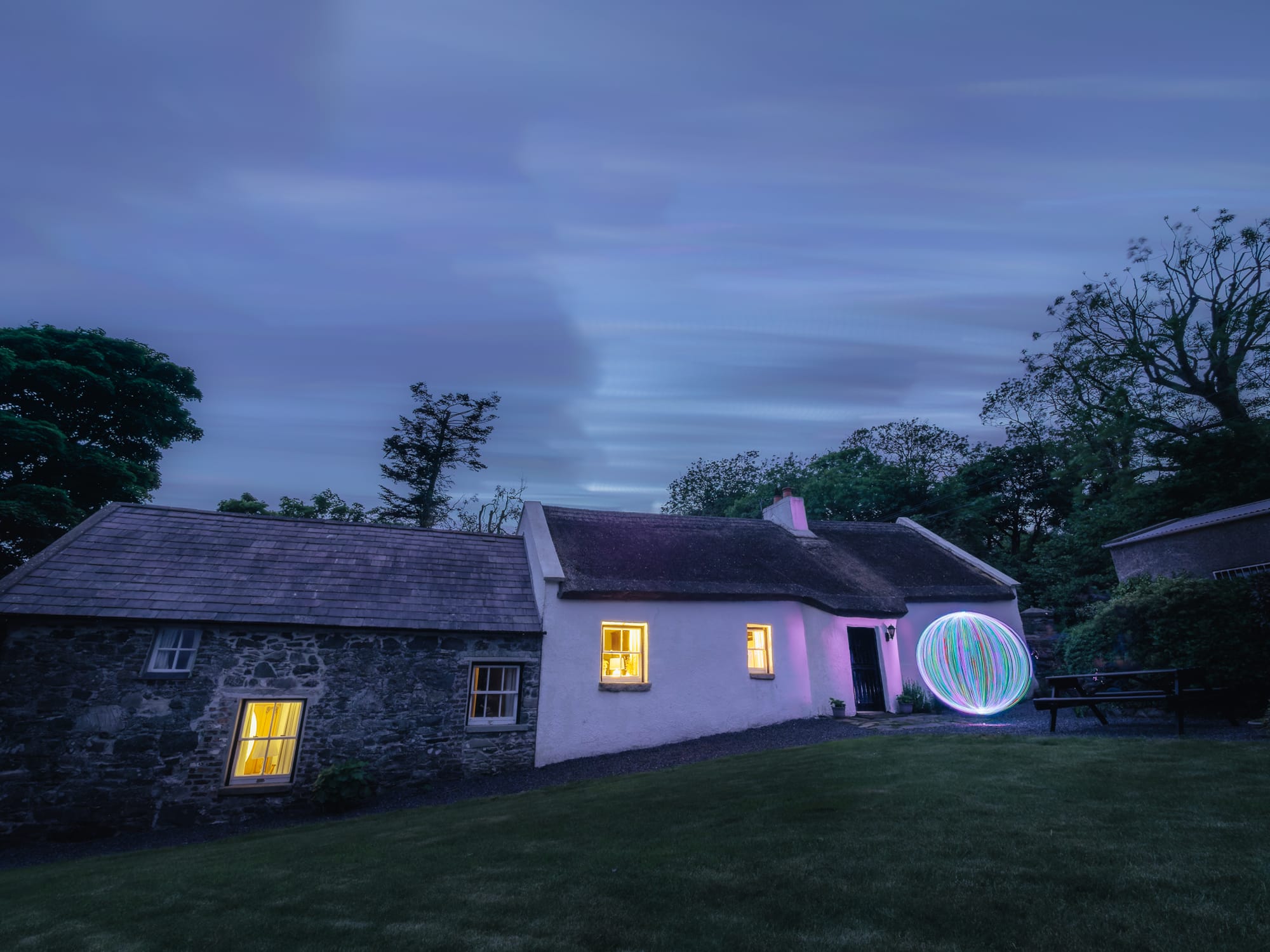 A nighttime cottage shot to illustrate distorted or crimped clouds