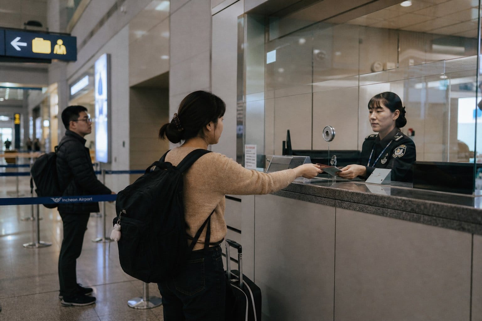 Korean immigration counter passport check