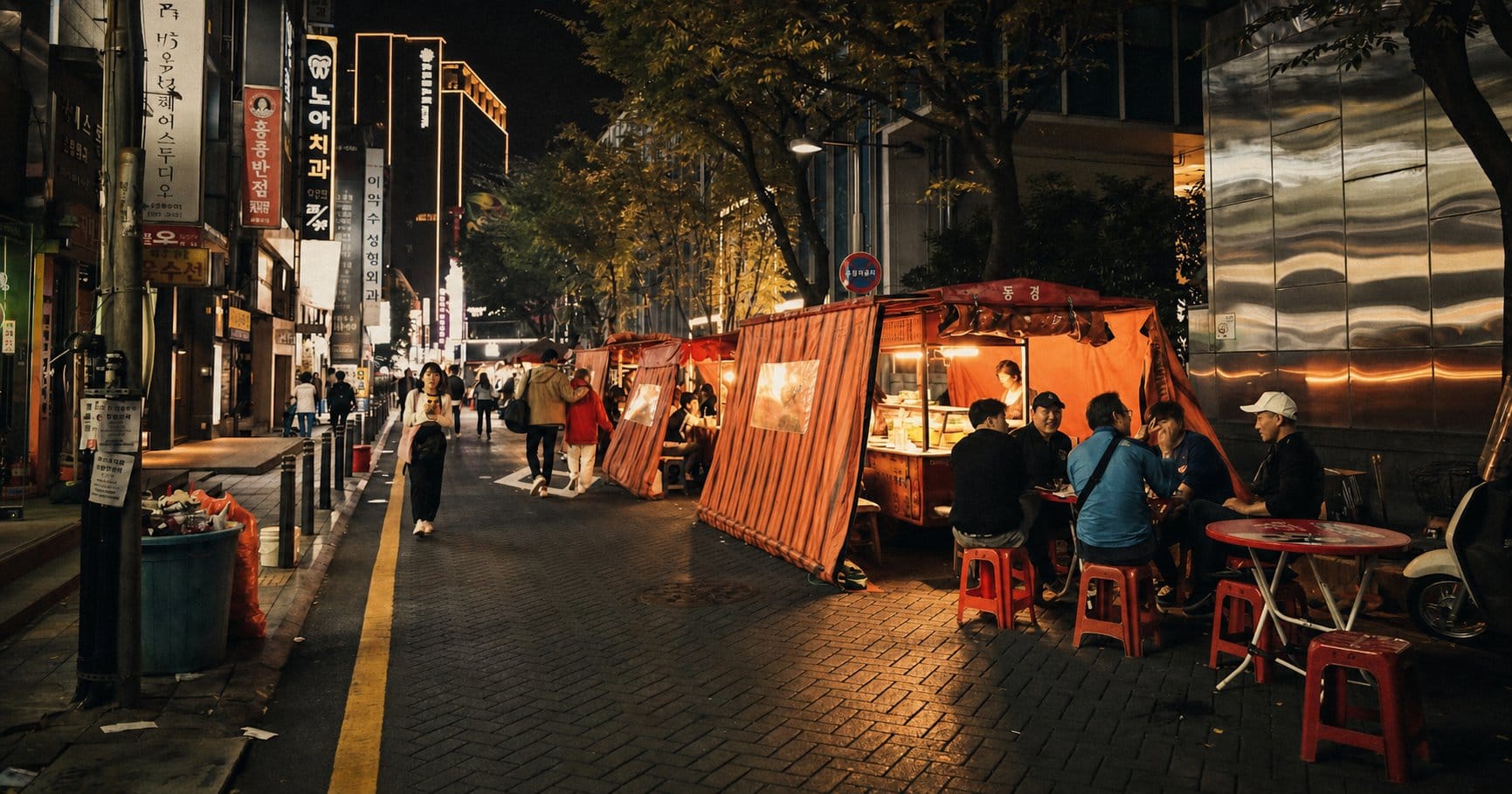 pojangmacha orange tent stall night