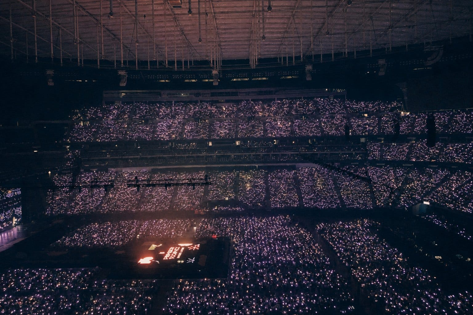 COER fandom fans at concert with light sticks