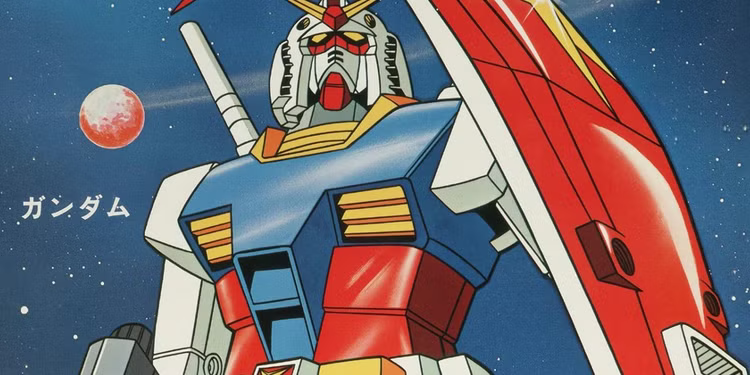 Illustration of a classic Gundam mech standing tall against a starry space background, holding a large red shield and featuring its iconic blue, red, and yellow armor. A small red planet appears in the distance, and Japanese characters for “Gundam” are printed on the left side.