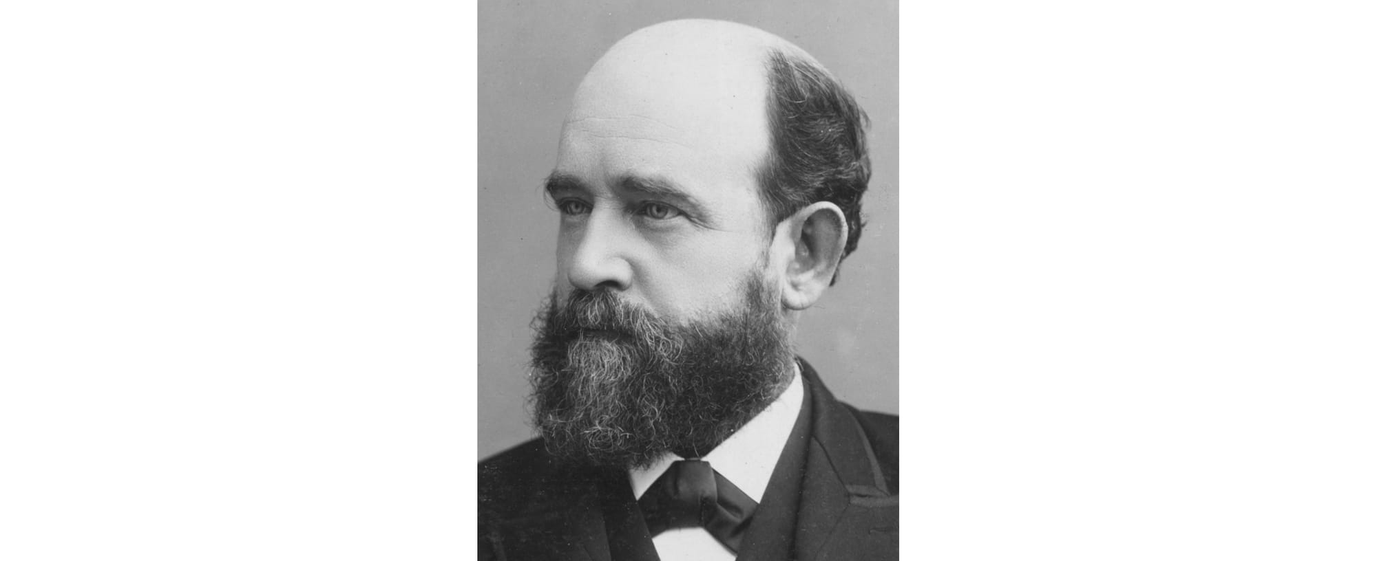 headshot of Henry George