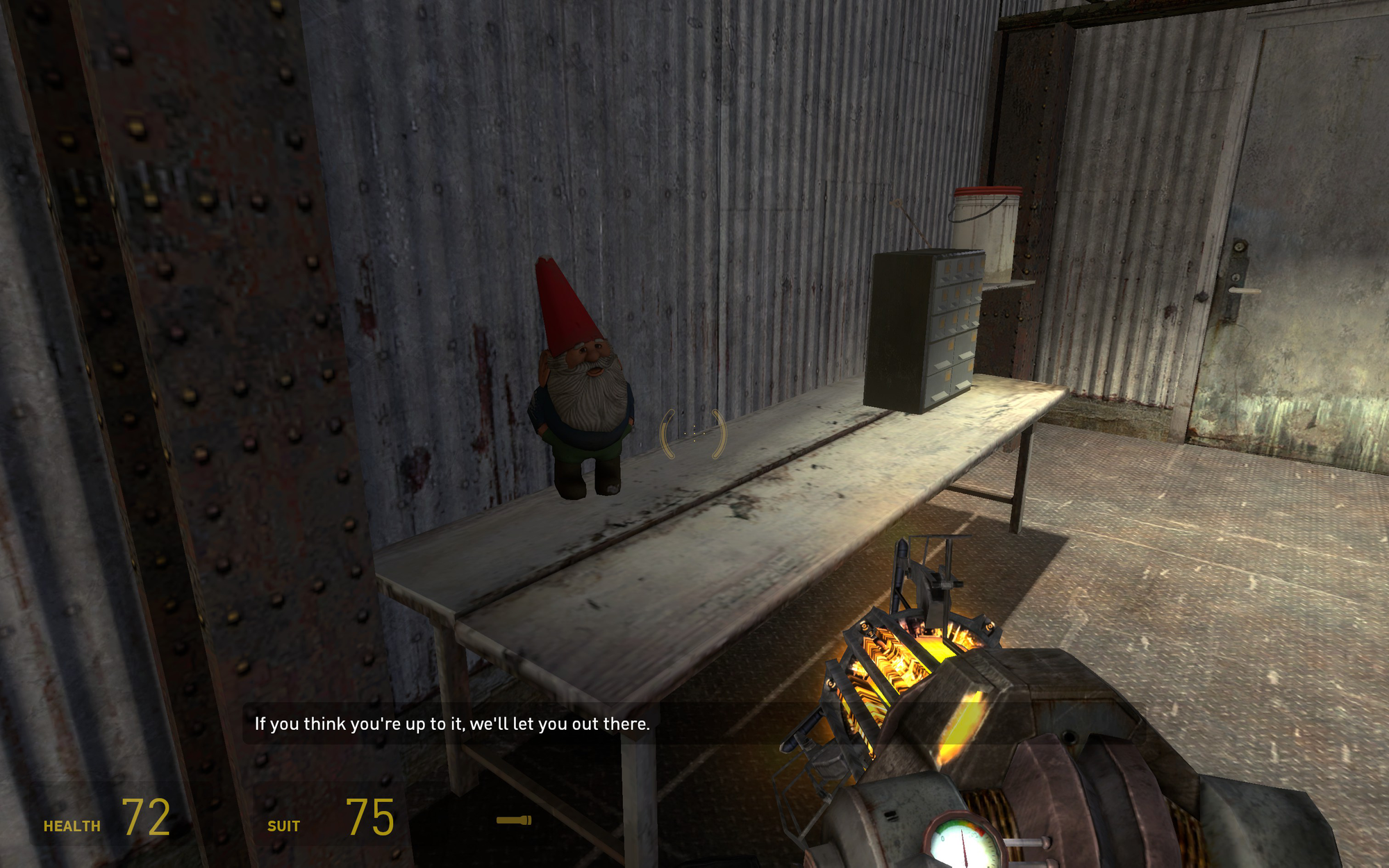 Gnome Chompski at a table in the mechanic's workshop, after the big fight against the Hunter Chopper.