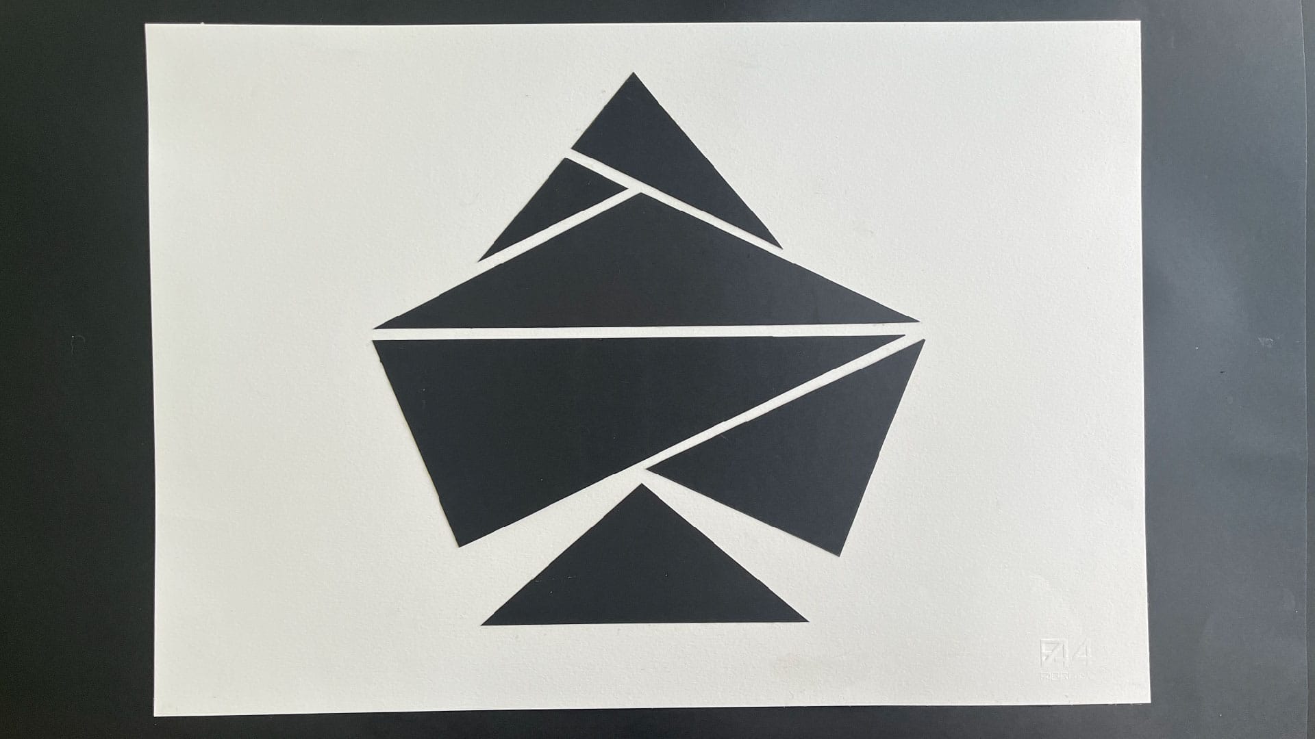 A spade composed of six triangles. Most of them converge to the right around the middle.