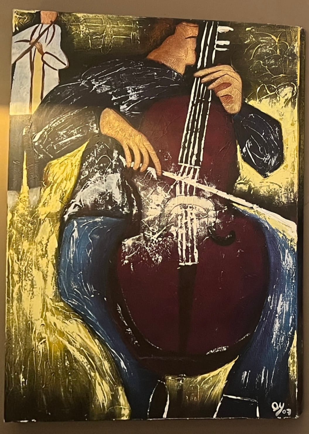 An impressionist painting of a person playing the cello. 