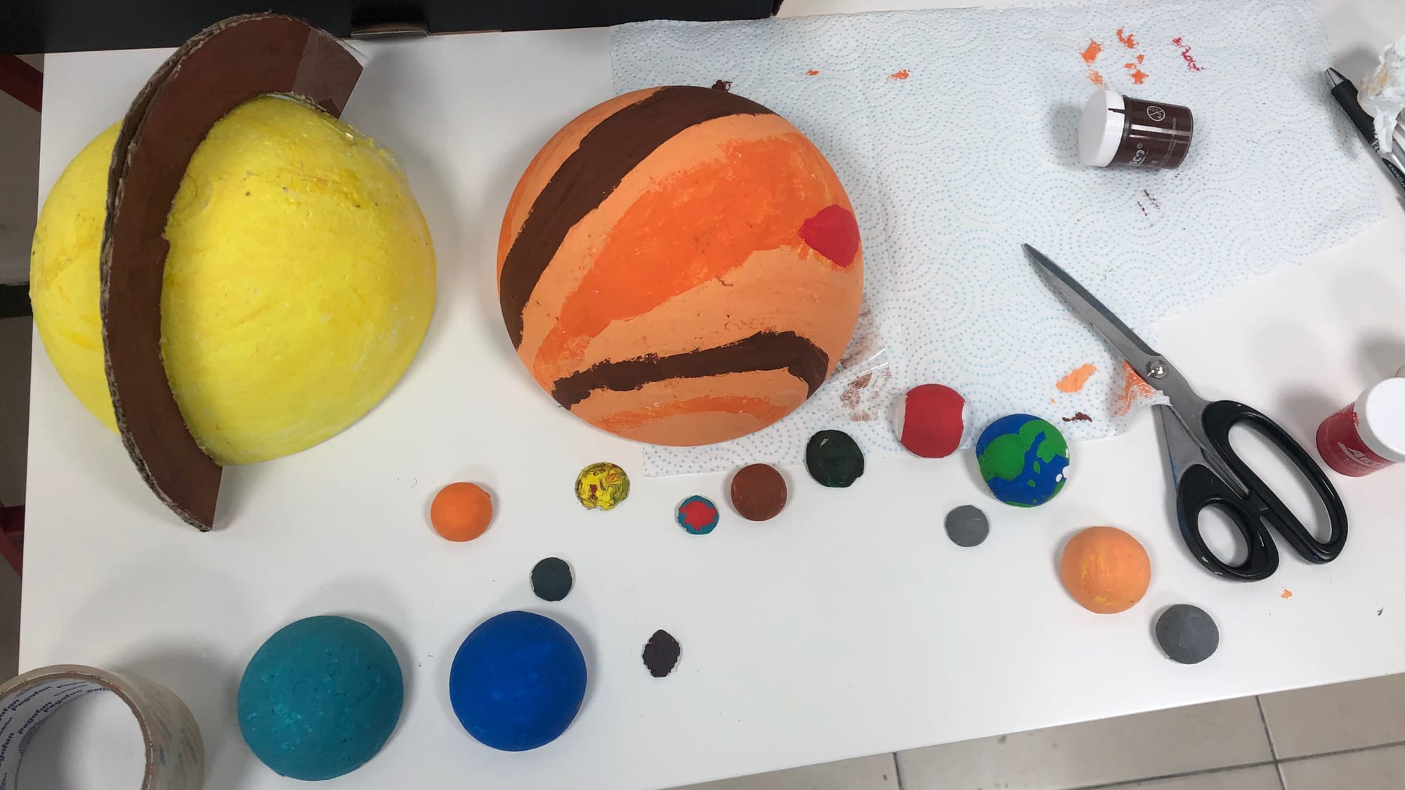 All the finished Solar System spheres. Mercury, Venus, Earth, the Moon, Mars, Jupiter, Io, Europa, Ganymede, Callisto, Saturn (with rings), Titan, Uranus, Neptune, Triton, and Pluto.