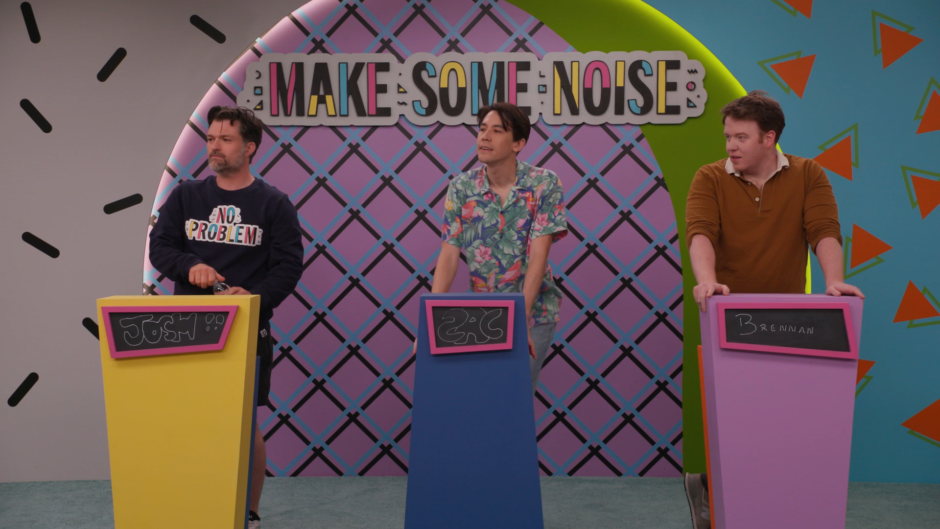 A screenshot of Make Some Noise S4Ep15, "The Noise Boys Hype Each Other Up", featuring Josh Ruben, Zac Oyama, and Brennan Lee Mulligan in their regular podiums.