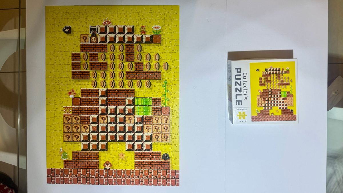 My completed Mario Maker Collector's Puzzle next to its box.