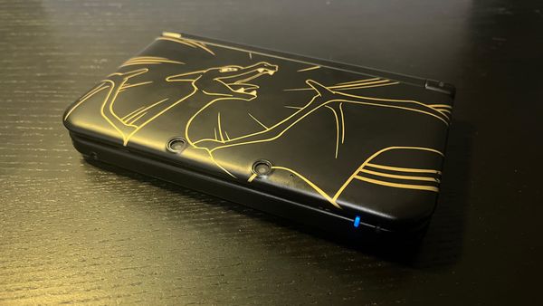 My Nintendo 3DS XL. It features a Charizard face plate.