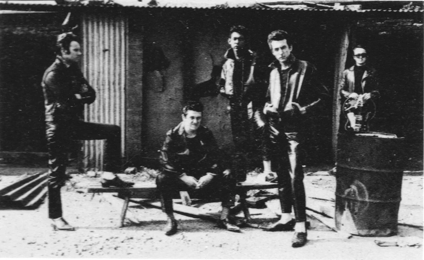 The Rutles posed with instruments, with Ollie Halsall at far right as Leppo.