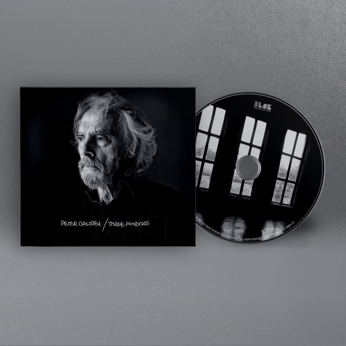 Peter Daltrey’s Three Windows CD digipak and disc, with a monochrome portrait and three-window artwork.