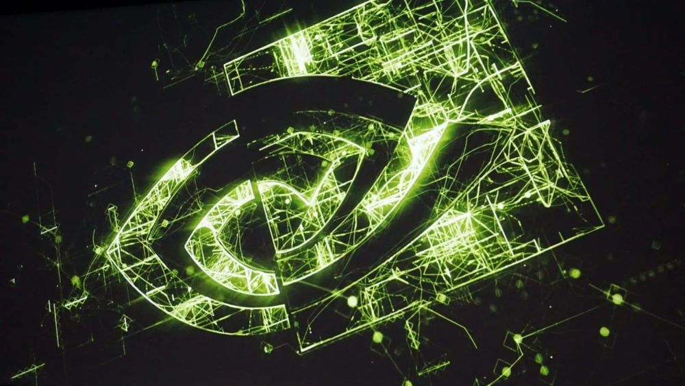 Logo de Nvidia, un géant américain des semi-conducteurs, affiché avec un effet futuriste et lumineux en vert sur fond noir.