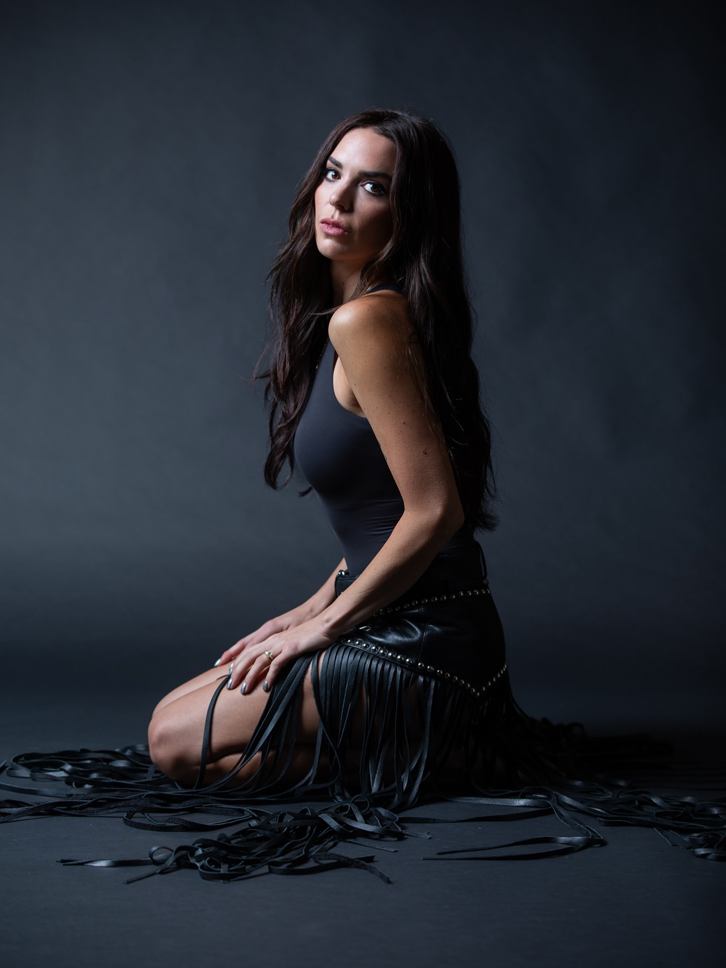 May be an image of one or more people, make-up and text