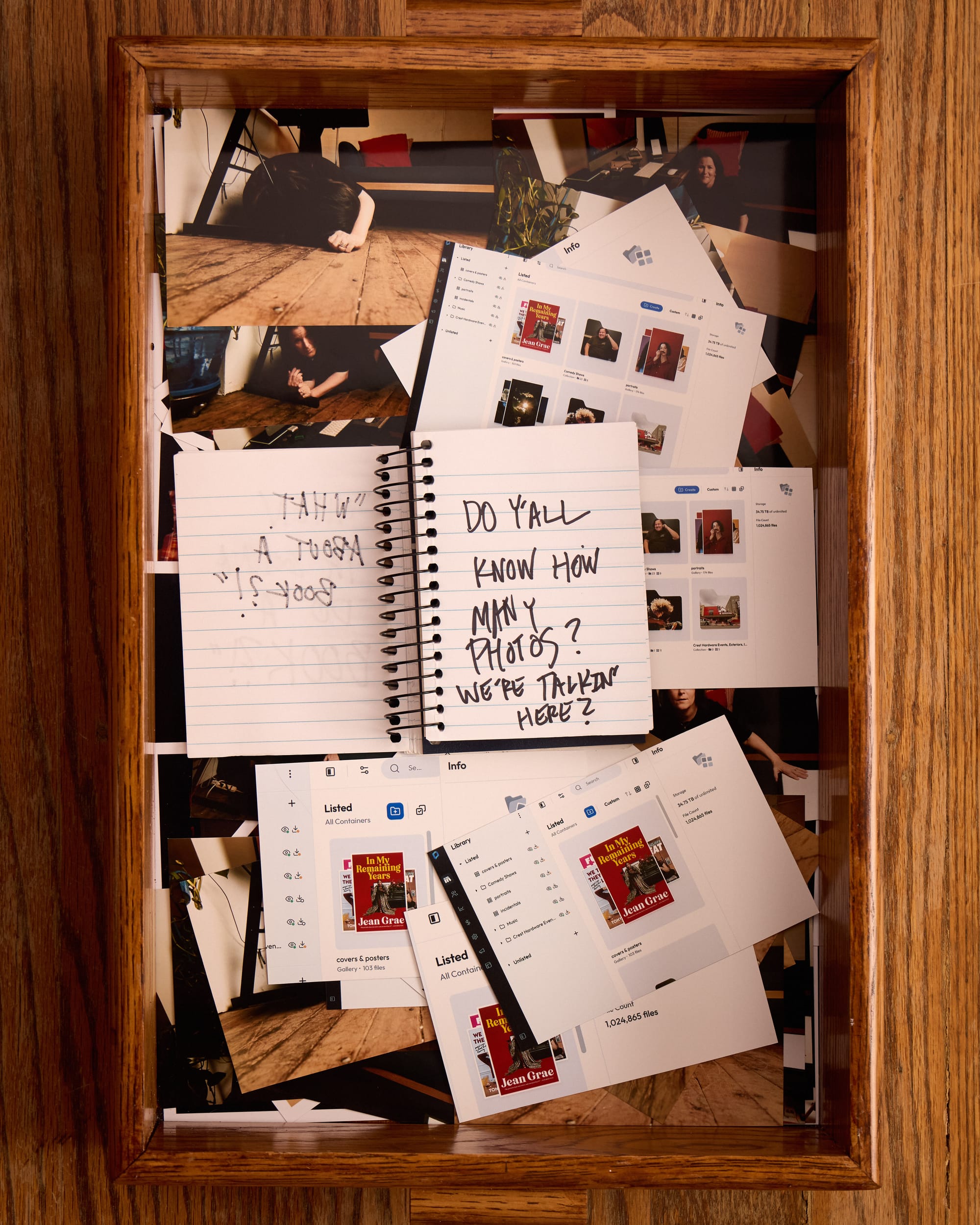 The notebook now says "Do y'all know how many photos we're talkin' here?". In the tray of 4x6 photos, there are screen grabs of Mindy’s archiving website. 