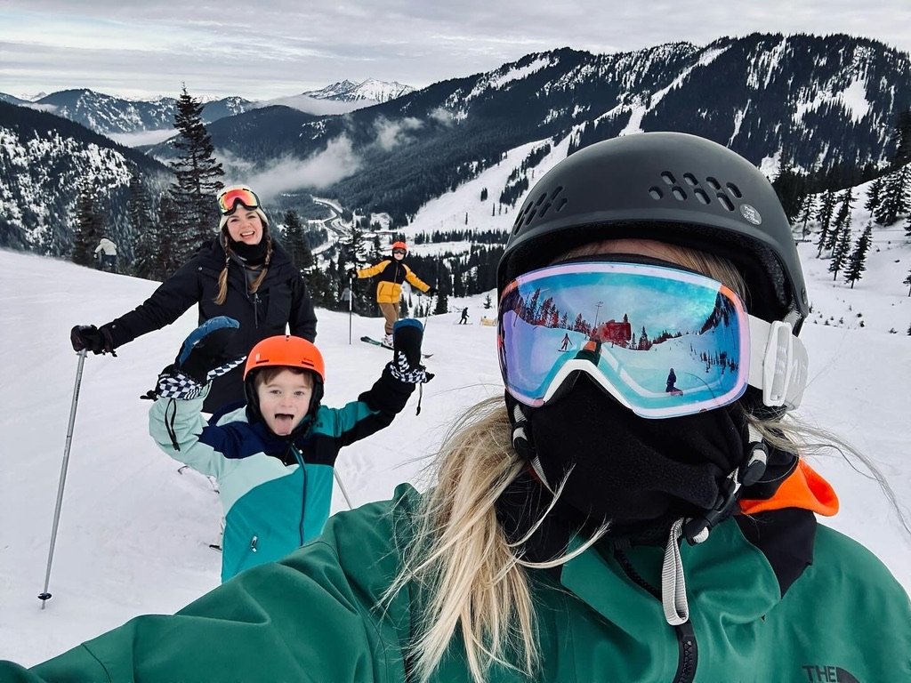   Salish Snow Sports Program Coordinator Jamie Jaynes (right) shares her love of skiing with her sons, Ivan (center) and Syd (rear) Jaynes. Joining them is Gillian Amas (center left), whose boyfriend met Jaynes on the PT ski bus when they were kids, and they still love skiing together. Photo courtesy of Jaime Jaynes  