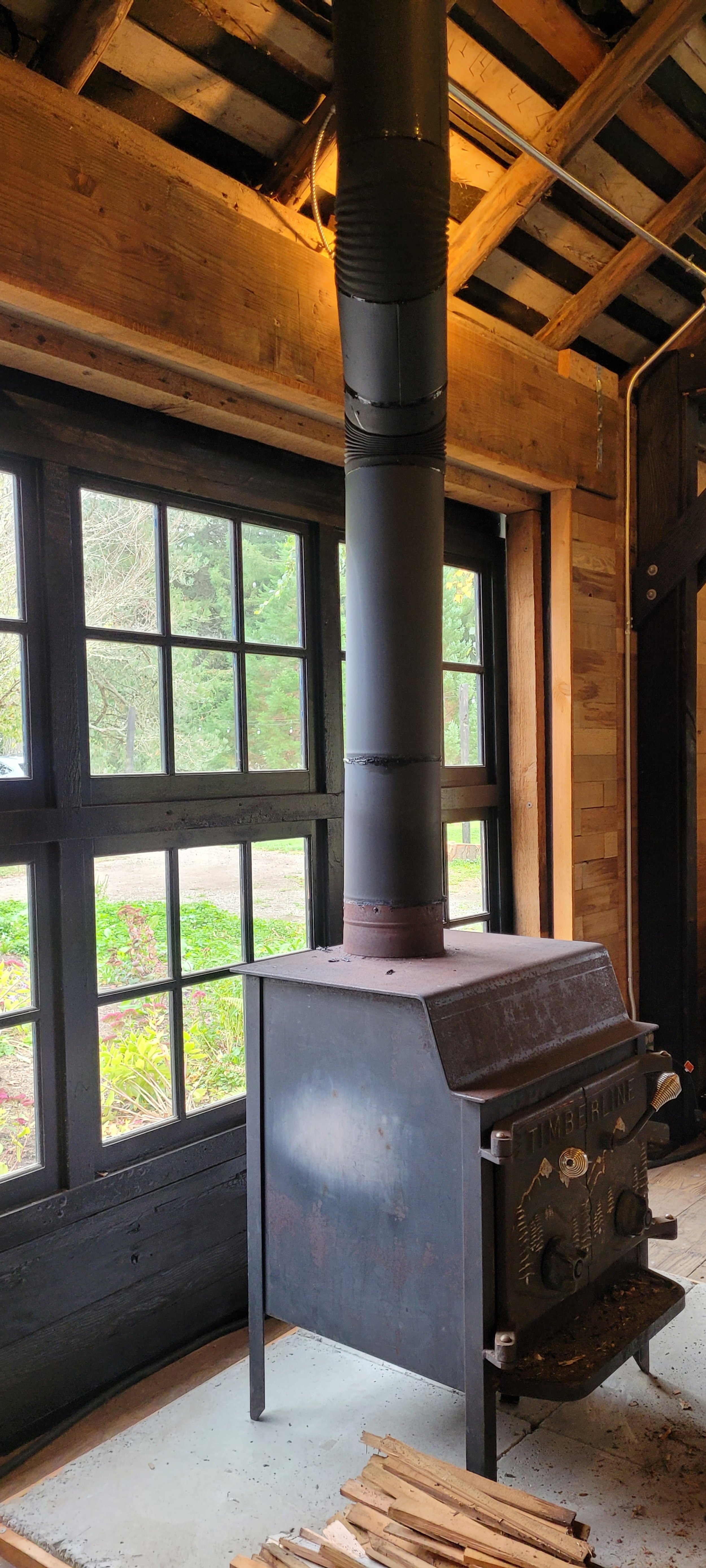  The farmhouse’s wood stove now warms concertgoers in the barn 