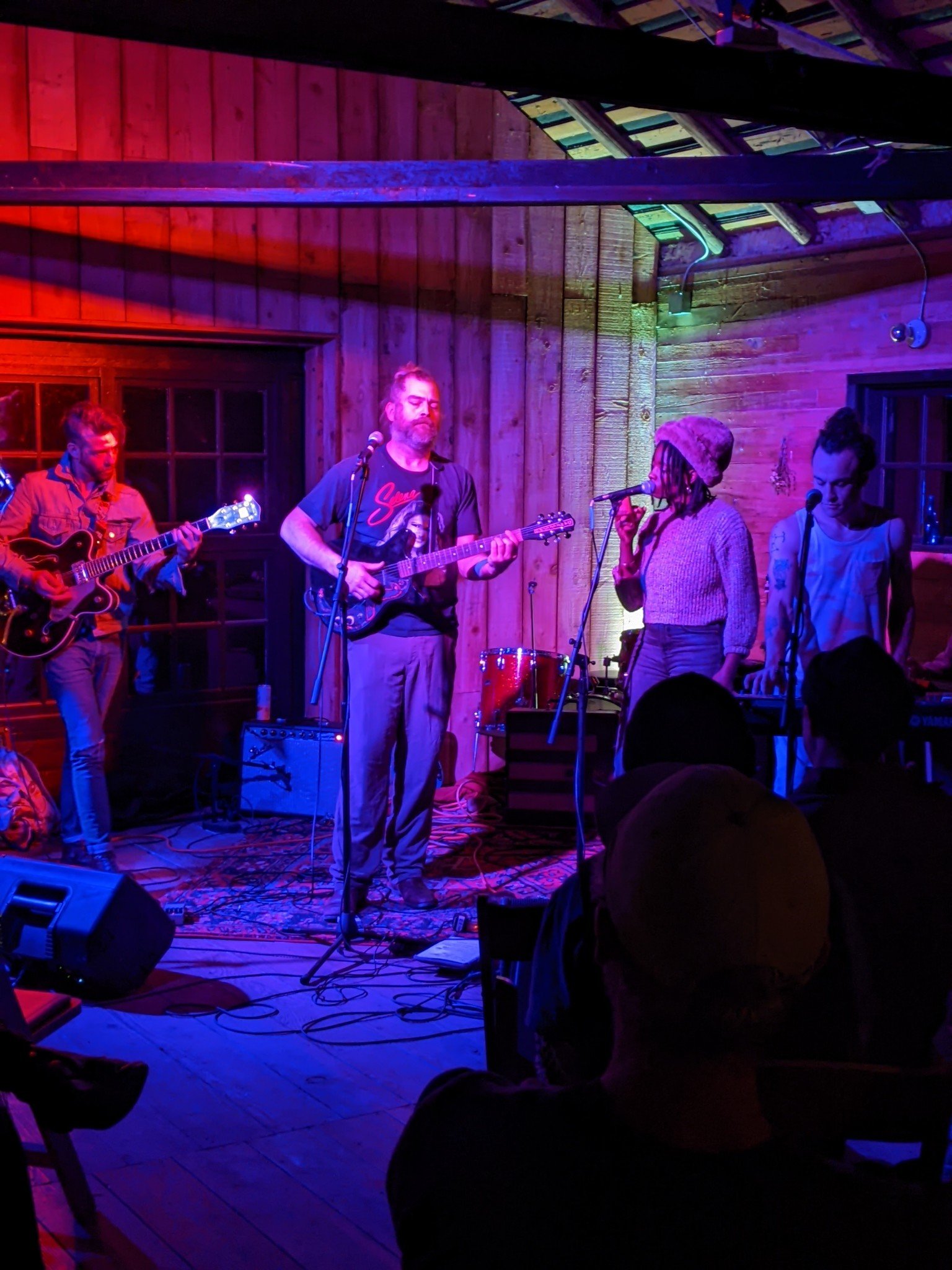  Karl Blau and his Germantown neighbors celebrate the last night of their tour at The Quilcene Lantern. Photo by Nigel O’Shea 